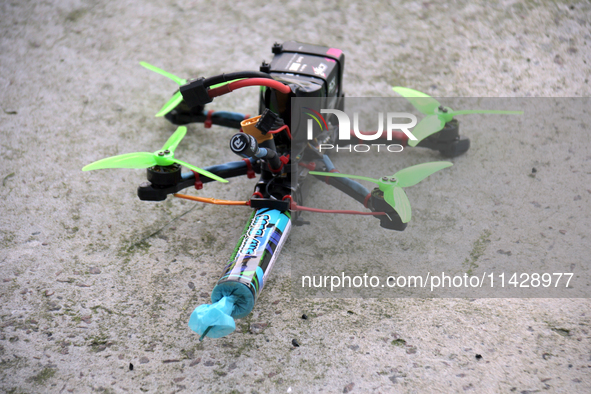 A drone with a smoke bomb is being seen during the 2nd Drone Racing Tournament by the Federation of Military and Technological Sports of Ukr...