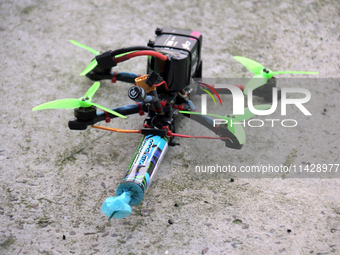 A drone with a smoke bomb is being seen during the 2nd Drone Racing Tournament by the Federation of Military and Technological Sports of Ukr...