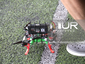 A cargo drone is being seen during the 2nd Drone Racing Tournament by the Federation of Military and Technological Sports of Ukraine in Bilo...