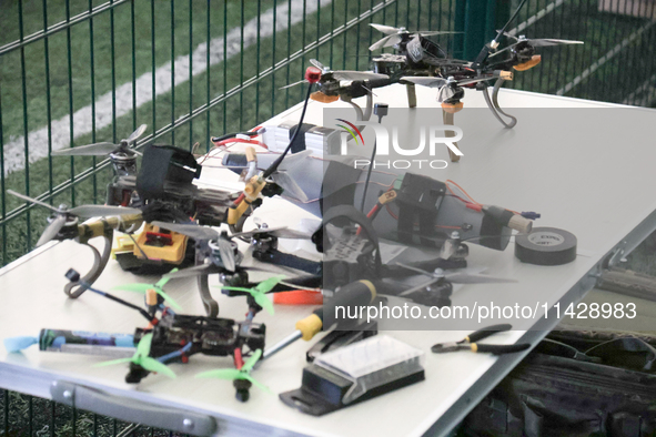 Drones are being seen during the 2nd Drone Racing Tournament by the Federation of Military Technological Sports of Ukraine in Bilohorodka, K...