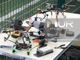 Drones are being seen during the 2nd Drone Racing Tournament by the Federation of Military Technological Sports of Ukraine in Bilohorodka, K...