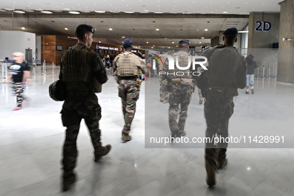 PARIS, FRANCE - JULY 22:   
One of many French Army patrols deployed in airports, train stations, and other crowded places and locations aro...