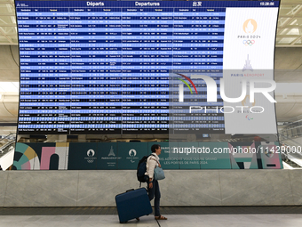 PARIS, FRANCE - JULY 22:   
Airport flights information electronic board with Paris 2024 Olympics and Paralympics logos, on July 22, 2024, i...