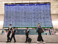 PARIS, FRANCE - JULY 22:   
Airport flights information electronic board with Paris 2024 Olympics and Paralympics logos, on July 22, 2024, i...