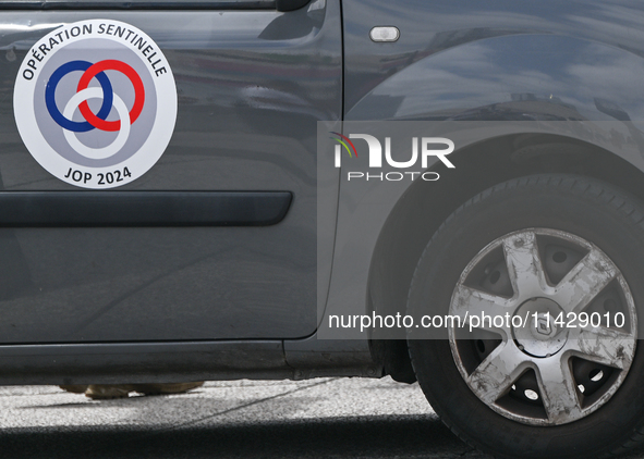 PARIS, FRANCE - JULY 22:   
Vans with Operation Sentinelle door markings and sticker, on July 22, 2024, in Paris France. 