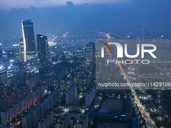 An evening view of Seoul's Han River and Yeouido Island, seen from the 63 Building in Seoul, South Korea. The 63 Building is a skyscraper on...