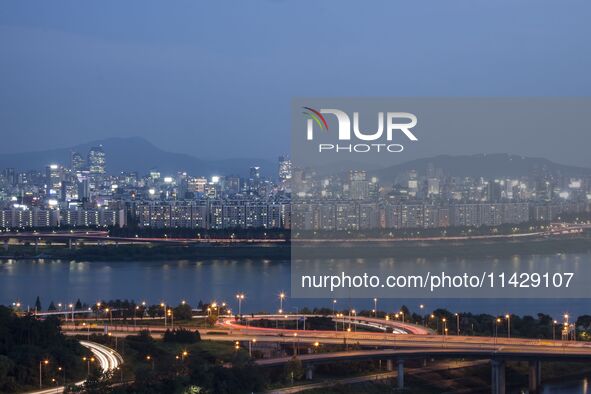 An evening view of Seoul's Han River and Gangnam, seen from Eungbongsan in Seoul, South Korea, on October 10, 2023. Eungbongsan is a mountai...