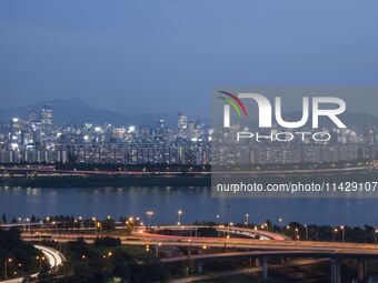 An evening view of Seoul's Han River and Gangnam, seen from Eungbongsan in Seoul, South Korea, on October 10, 2023. Eungbongsan is a mountai...