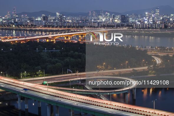 An evening view of Seoul's Han River and Gangnam, seen from Eungbongsan in Seoul, South Korea, on October 10, 2023. Eungbongsan is a mountai...