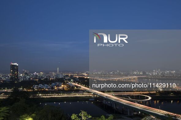 An evening view of Seoul's Han River and Gangnam, seen from Eungbongsan in Seoul, South Korea, on October 10, 2023. Eungbongsan is a mountai...