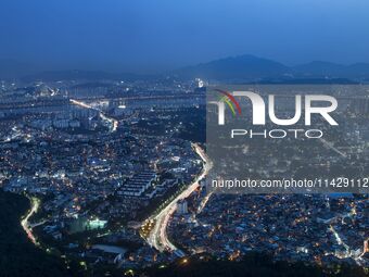 An evening view of Seoul's Itaewon and Gangnam is being seen from the N Seoul Tower in Seoul, South Korea. The N Seoul Tower is a communicat...