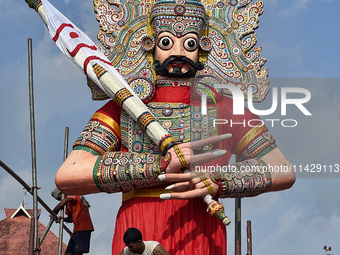 Workers are erecting giant idols of the Pandavas along the eastern entrance of the historic Sree Padmanabhaswamy Temple in preparation for t...