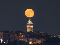 Moonrise Over The Galata Tower Istanbul, Turkiye On 22nd July 2024.(