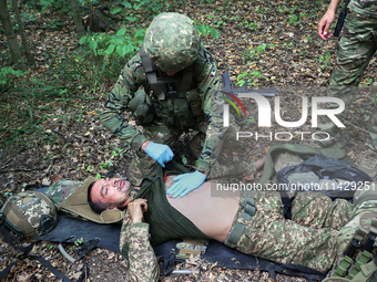 Servicemen of the 3rd Colonel Petro Bolbochan Brigade of Operational Assignment of Ukraine's National Guard (also known as the Spartan Briga...