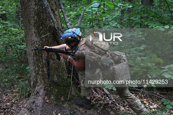 A serviceman of the 3rd Colonel Petro Bolbochan Brigade of Operational Assignment of Ukraine's National Guard (also known as the Spartan Bri...