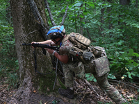 A serviceman of the 3rd Colonel Petro Bolbochan Brigade of Operational Assignment of Ukraine's National Guard (also known as the Spartan Bri...