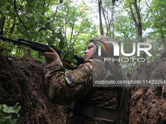 A serviceman of the 3rd Colonel Petro Bolbochan Brigade of Operational Assignment of Ukraine's National Guard (also known as the Spartan Bri...