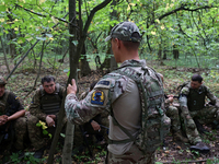 A serviceman of the Smurfs Task Force Police Regiment is attending a tactical exercise in Ukraine, on July 22, 2024. (