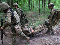 Servicemen of the 3rd Colonel Petro Bolbochan Brigade of Operational Assignment of Ukraine's National Guard (also known as the Spartan Briga...