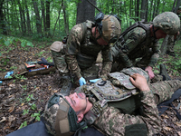 Servicemen of the 3rd Colonel Petro Bolbochan Brigade of Operational Assignment of Ukraine's National Guard (also known as the Spartan Briga...