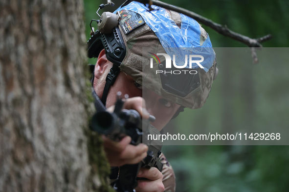 A serviceman of the 3rd Colonel Petro Bolbochan Brigade of Operational Assignment of Ukraine's National Guard (also known as the Spartan Bri...