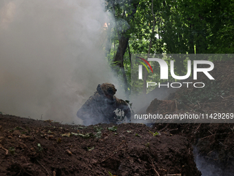 A serviceman of the 3rd Colonel Petro Bolbochan Brigade of Operational Assignment of Ukraine's National Guard (also known as the Spartan Bri...