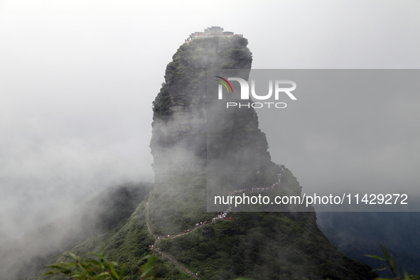 An aerial photo is showing Mount Fanjing goldentop in Tongren city, Guizhou province, China, on July 16, 2024. 