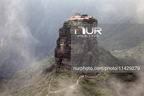 An aerial photo is showing Mount Fanjing goldentop in Tongren city, Guizhou province, China, on July 16, 2024. 