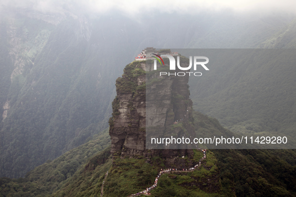 An aerial photo is showing Mount Fanjing goldentop in Tongren city, Guizhou province, China, on July 16, 2024. 