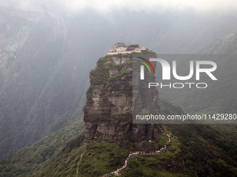 An aerial photo is showing Mount Fanjing goldentop in Tongren city, Guizhou province, China, on July 16, 2024. (