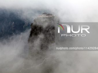 An aerial photo is showing Mount Fanjing goldentop in Tongren city, Guizhou province, China, on July 16, 2024. (