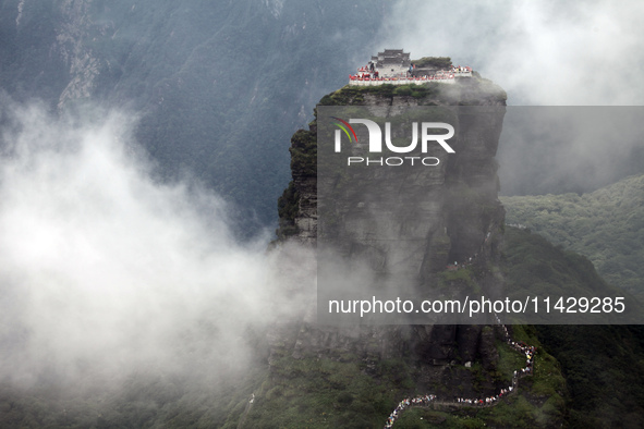 An aerial photo is showing Mount Fanjing goldentop in Tongren city, Guizhou province, China, on July 16, 2024. 