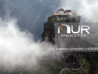 An aerial photo is showing Mount Fanjing goldentop in Tongren city, Guizhou province, China, on July 16, 2024. (