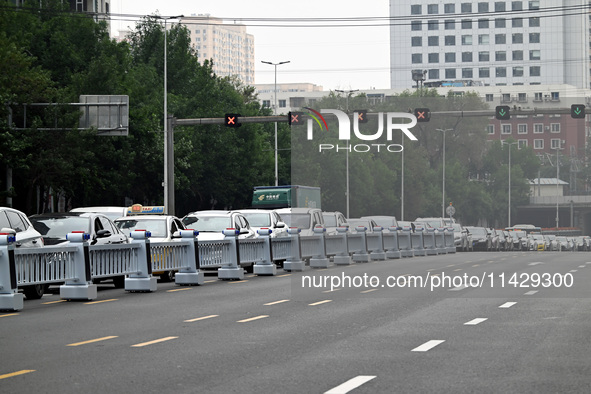 An intelligent mobile guardrail of a ''tidal lane robot'' is being seen at Shenyang Youth North Street in Shenyang, Liaoning province, China...