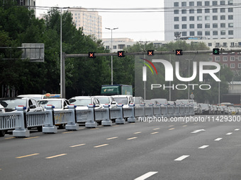 An intelligent mobile guardrail of a ''tidal lane robot'' is being seen at Shenyang Youth North Street in Shenyang, Liaoning province, China...