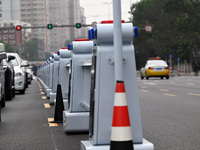 An intelligent mobile guardrail of a ''tidal lane robot'' is being seen at Shenyang Youth North Street in Shenyang, Liaoning province, China...