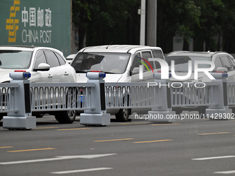 An intelligent mobile guardrail of a ''tidal lane robot'' is being seen at Shenyang Youth North Street in Shenyang, Liaoning province, China...