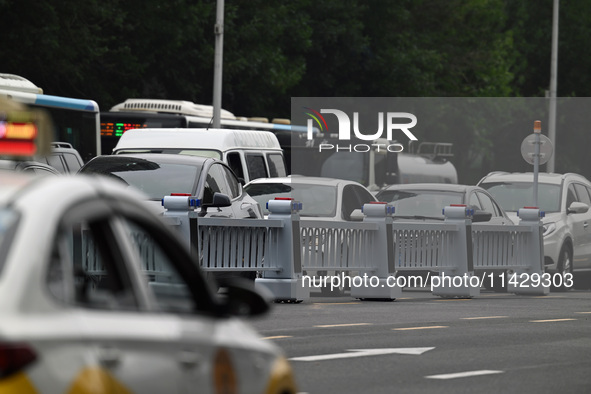 An intelligent mobile guardrail of a ''tidal lane robot'' is being seen at Shenyang Youth North Street in Shenyang, Liaoning province, China...