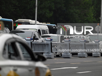 An intelligent mobile guardrail of a ''tidal lane robot'' is being seen at Shenyang Youth North Street in Shenyang, Liaoning province, China...