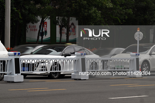 An intelligent mobile guardrail of a ''tidal lane robot'' is being seen at Shenyang Youth North Street in Shenyang, Liaoning province, China...