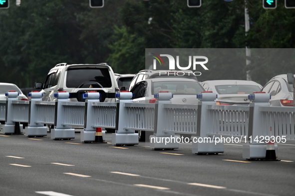 An intelligent mobile guardrail of a ''tidal lane robot'' is being seen at Shenyang Youth North Street in Shenyang, Liaoning province, China...