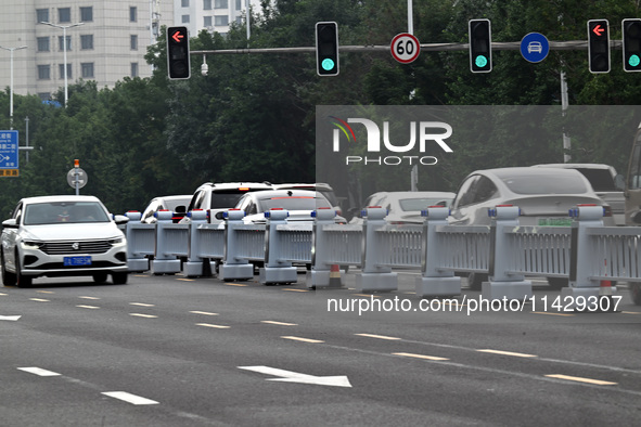 An intelligent mobile guardrail of a ''tidal lane robot'' is being seen at Shenyang Youth North Street in Shenyang, Liaoning province, China...