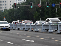 An intelligent mobile guardrail of a ''tidal lane robot'' is being seen at Shenyang Youth North Street in Shenyang, Liaoning province, China...