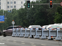 An intelligent mobile guardrail of a ''tidal lane robot'' is being seen at Shenyang Youth North Street in Shenyang, Liaoning province, China...