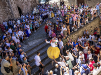 The dancers are descending in Anguiano, Spain, on July 22, 2024. (