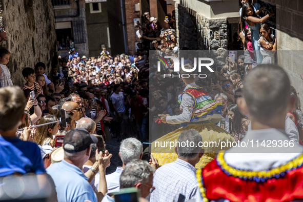 The dancers are descending in Anguiano, Spain, on July 22, 2024. 