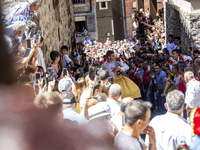 The dancers are descending in Anguiano, Spain, on July 22, 2024. (