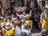 The dancers are descending in Anguiano, Spain, on July 22, 2024. (