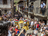 The dancers are descending in Anguiano, Spain, on July 22, 2024. (