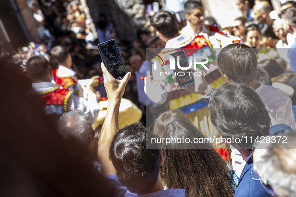 The dancers are descending in Anguiano, Spain, on July 22, 2024. 